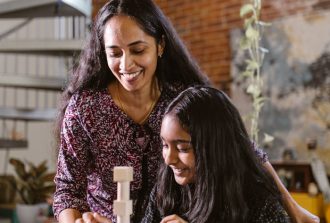 A Girl Building Blocks